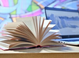 normal normal open book on the table close up of a fanned book 2025 01 10 03 09 29 utc